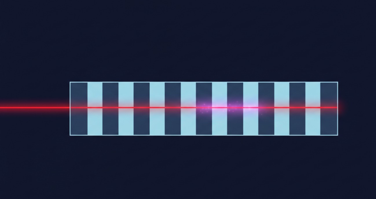 A periodically poled lithium niobate crystal showing alternating ferroelectric domains that enable quasi-phase-matched frequency conversion.